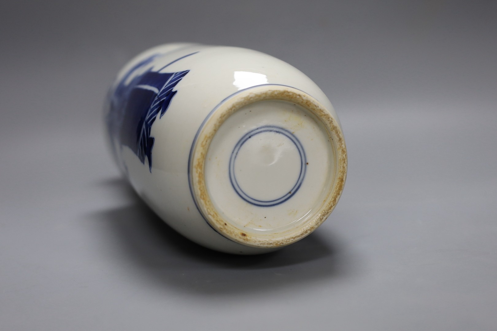 A Chinese blue and white rouleau vase, 35 cms.